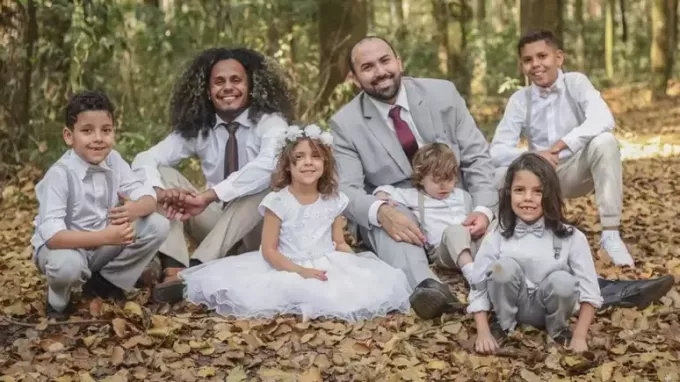 Gay couple who adopted 5 children.