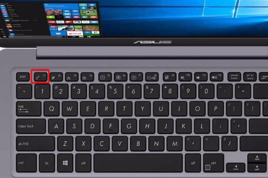 ¿Dónde está el botón de sueño de la laptop?